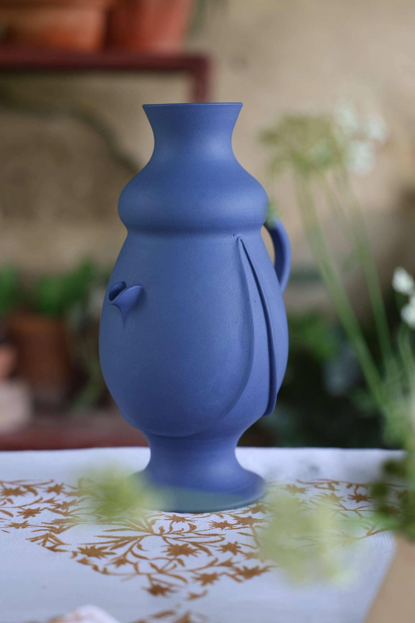 Traditional Sicilian ceramic bummulo malandrino jug from Caltagirone
