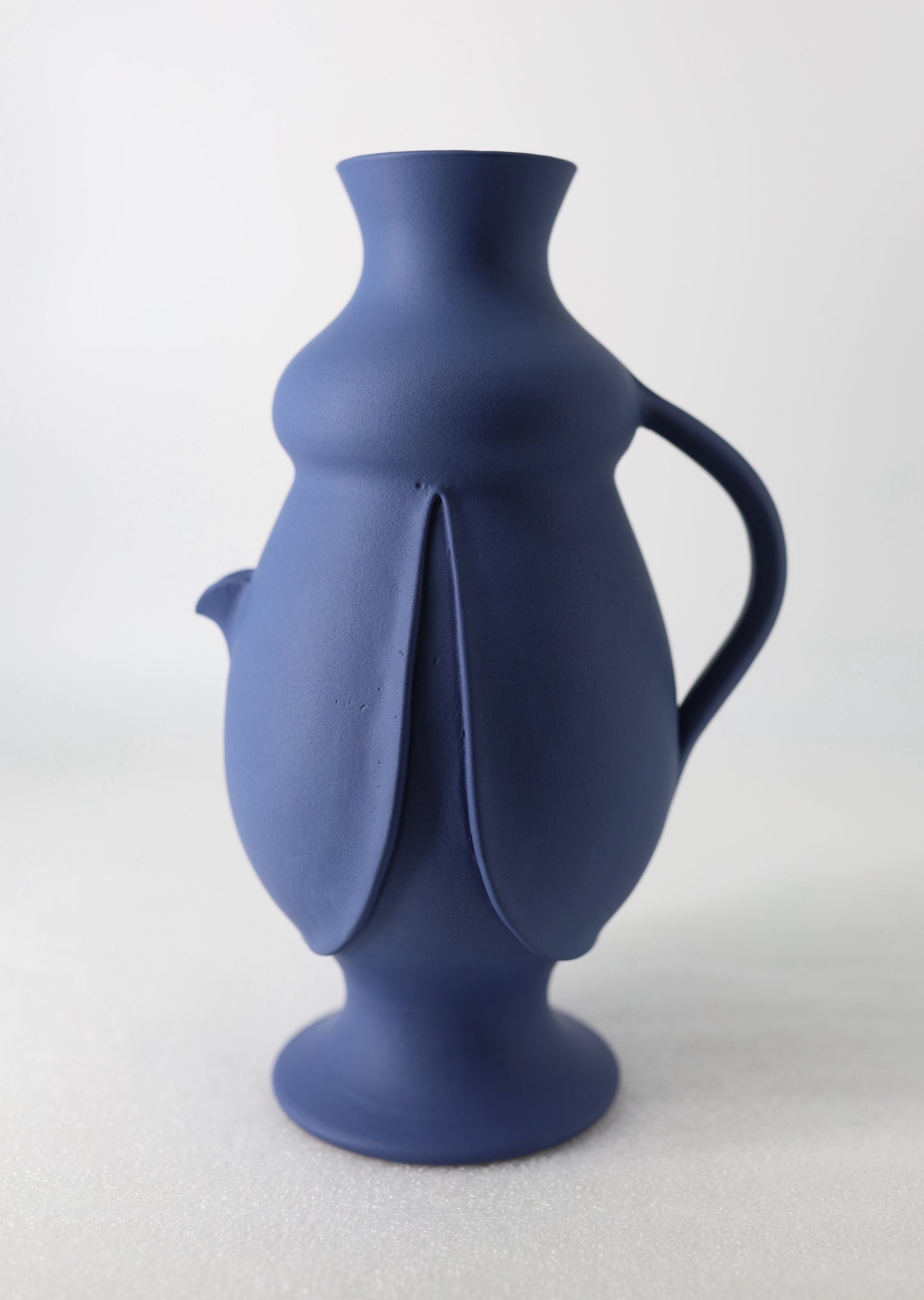 Authentic Sicilian ceramic bummulo malandrino from Caltagirone, a jug that fills in reverse.