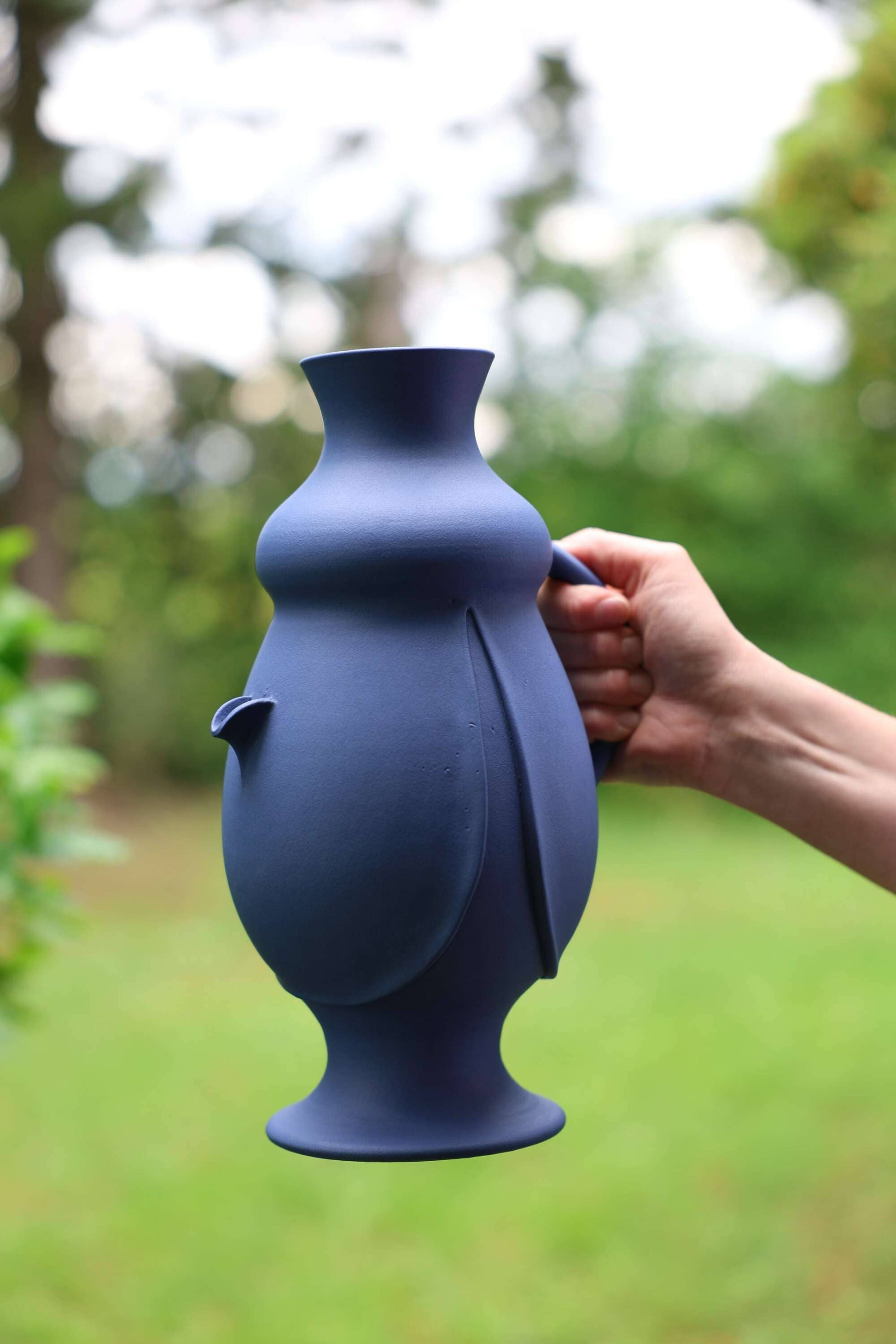 Authentic Sicilian ceramic bummulo malandrino, a jug that fills in reverse.