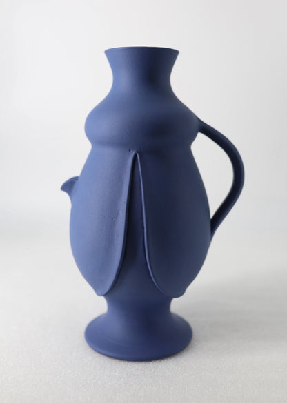 Authentic Sicilian ceramic bummulo malandrino from Caltagirone, a jug that fills in reverse.