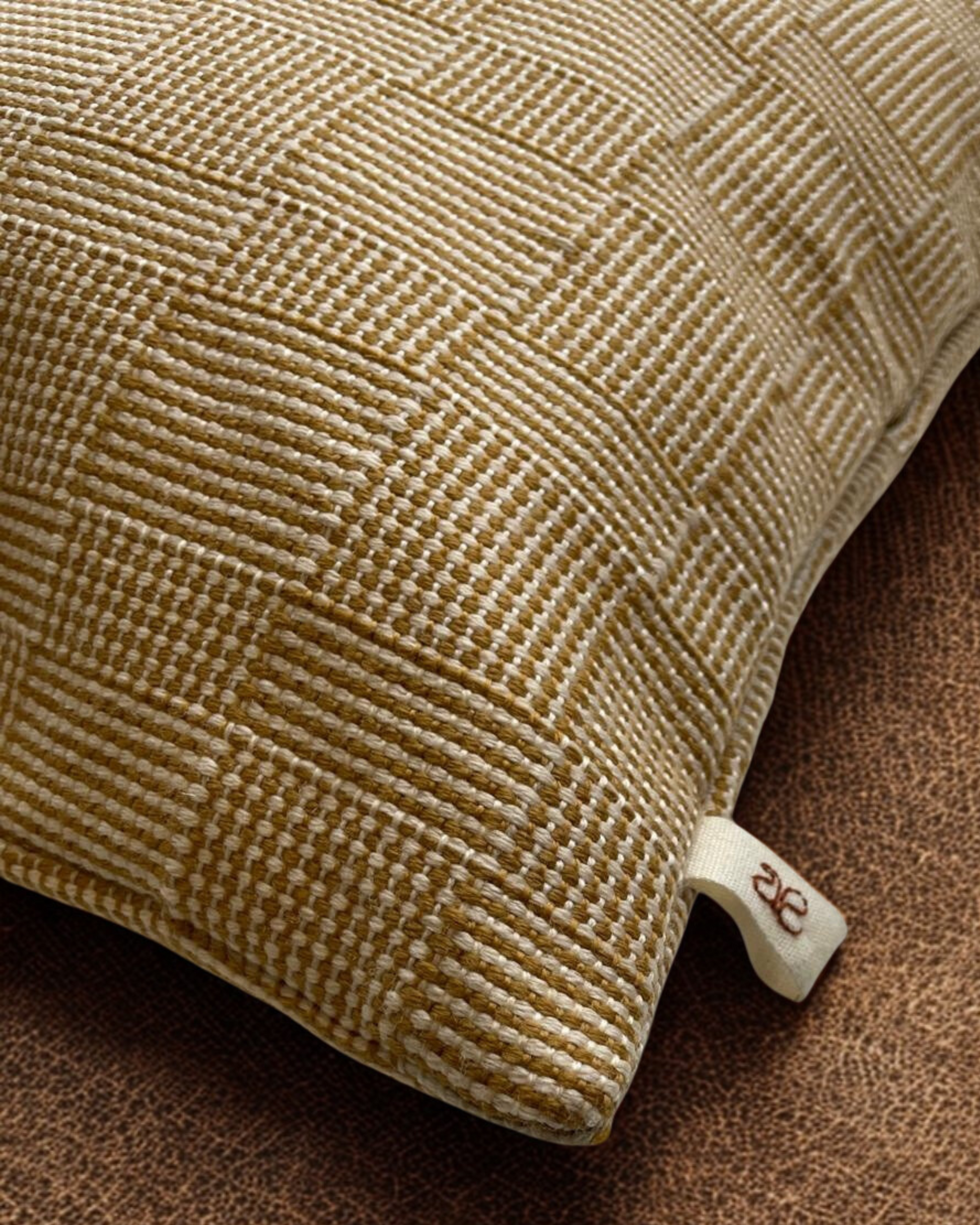 Handmade merino wool pillowcase crafted by a Tuscan artisan on a traditional wooden loom.
